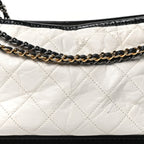 Aged Calfskin Quilted Medium Gabrielle Hobo Black White