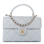 Caviar Quilted Mini Retro Twist Top Handle Flap Light Blue