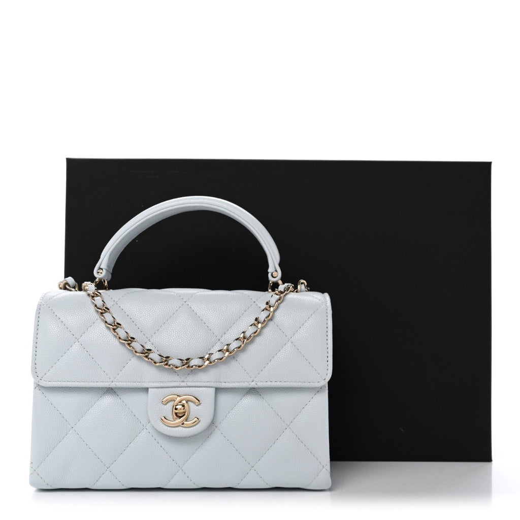 Caviar Quilted Mini Retro Twist Top Handle Flap Light Blue