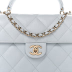 Caviar Quilted Mini Retro Twist Top Handle Flap Light Blue