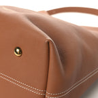 Grained Calfskin Low Key Hobo MM Cognac