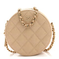 Iridescent Caviar Quilted Round Clutch With Chain Beige