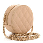Iridescent Caviar Quilted Round Clutch With Chain Beige