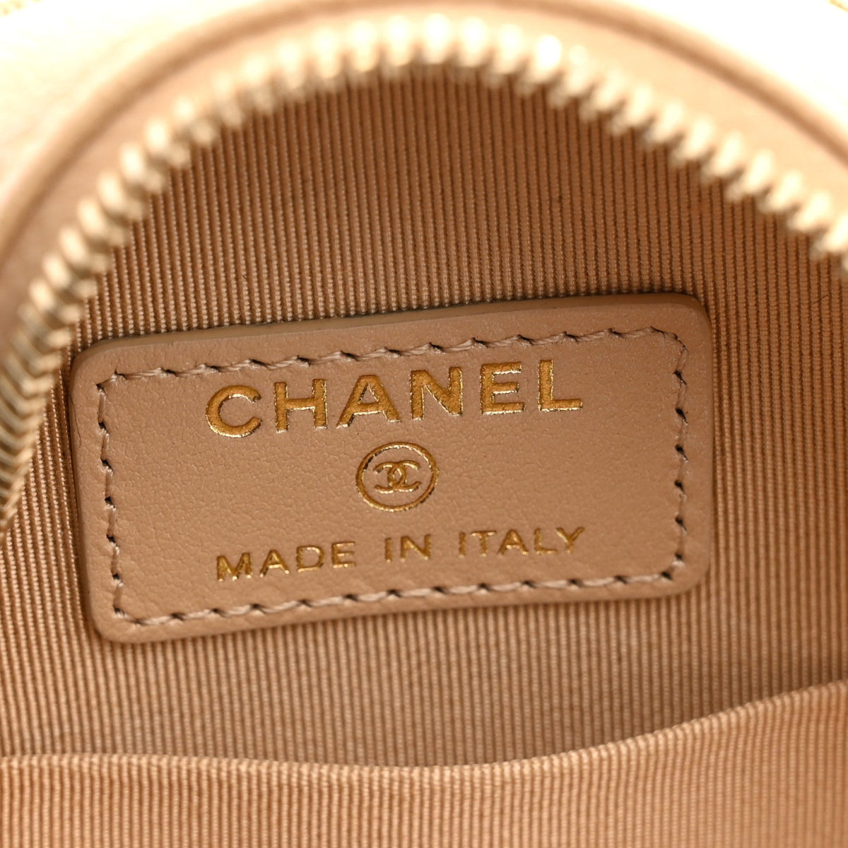 Iridescent Caviar Quilted Round Clutch With Chain Beige