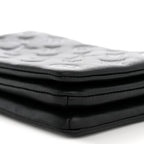 Lambskin Embossed Monogram Pochette Coussin Black