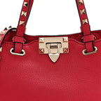 Pebbled Calfskin Mini Rockstud Tote Cyclamin