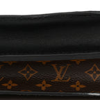 Reverse Monogram Trunk Clutch