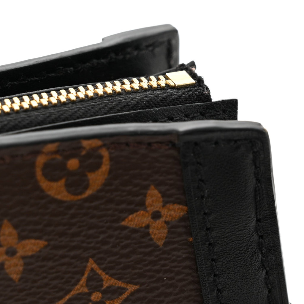 Reverse Monogram Trunk Clutch