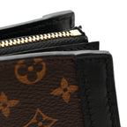 Reverse Monogram Trunk Clutch