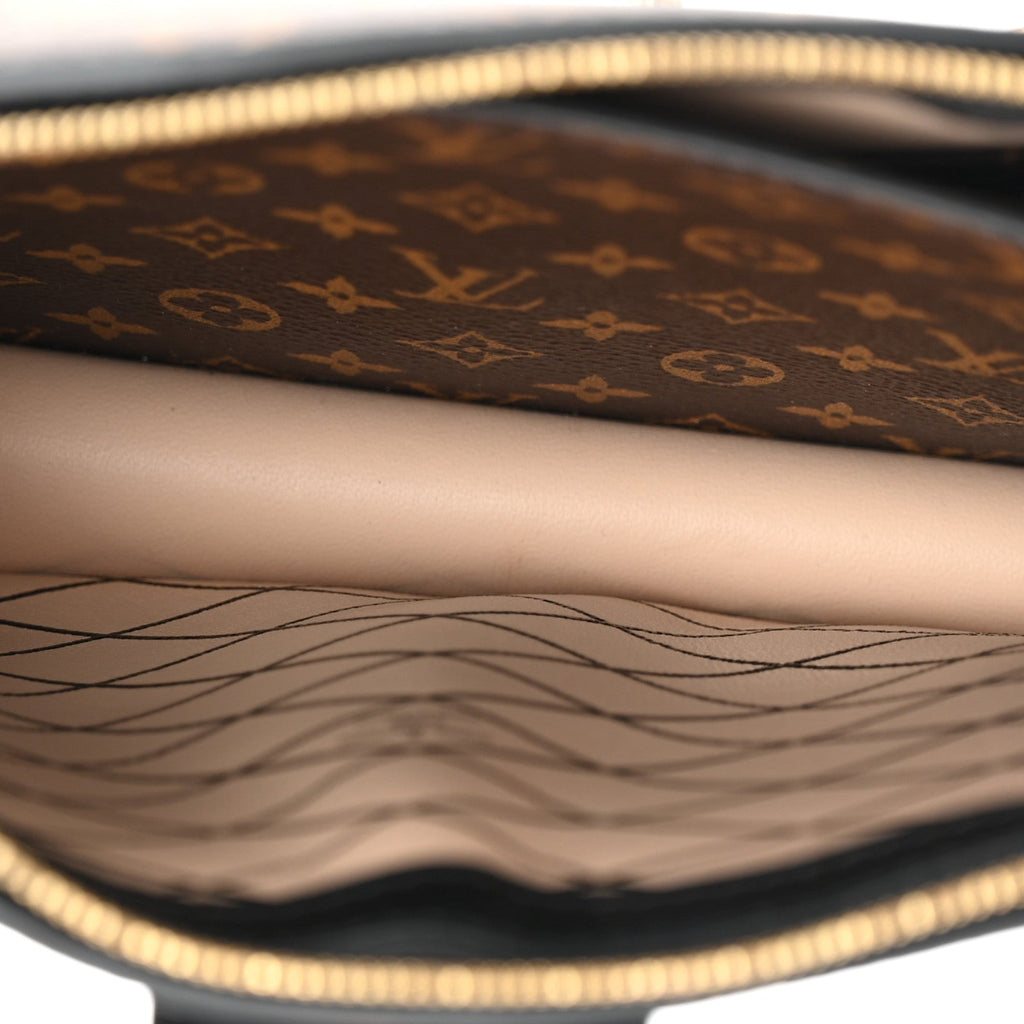 Reverse Monogram Trunk Clutch