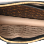 Reverse Monogram Trunk Clutch