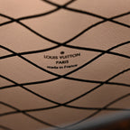 Reverse Monogram Trunk Clutch