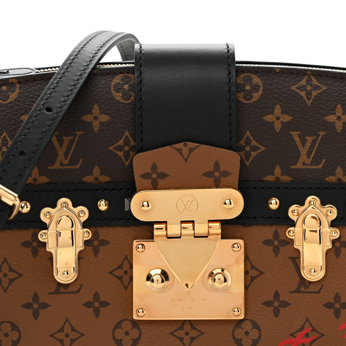 Reverse Monogram Trunk Clutch