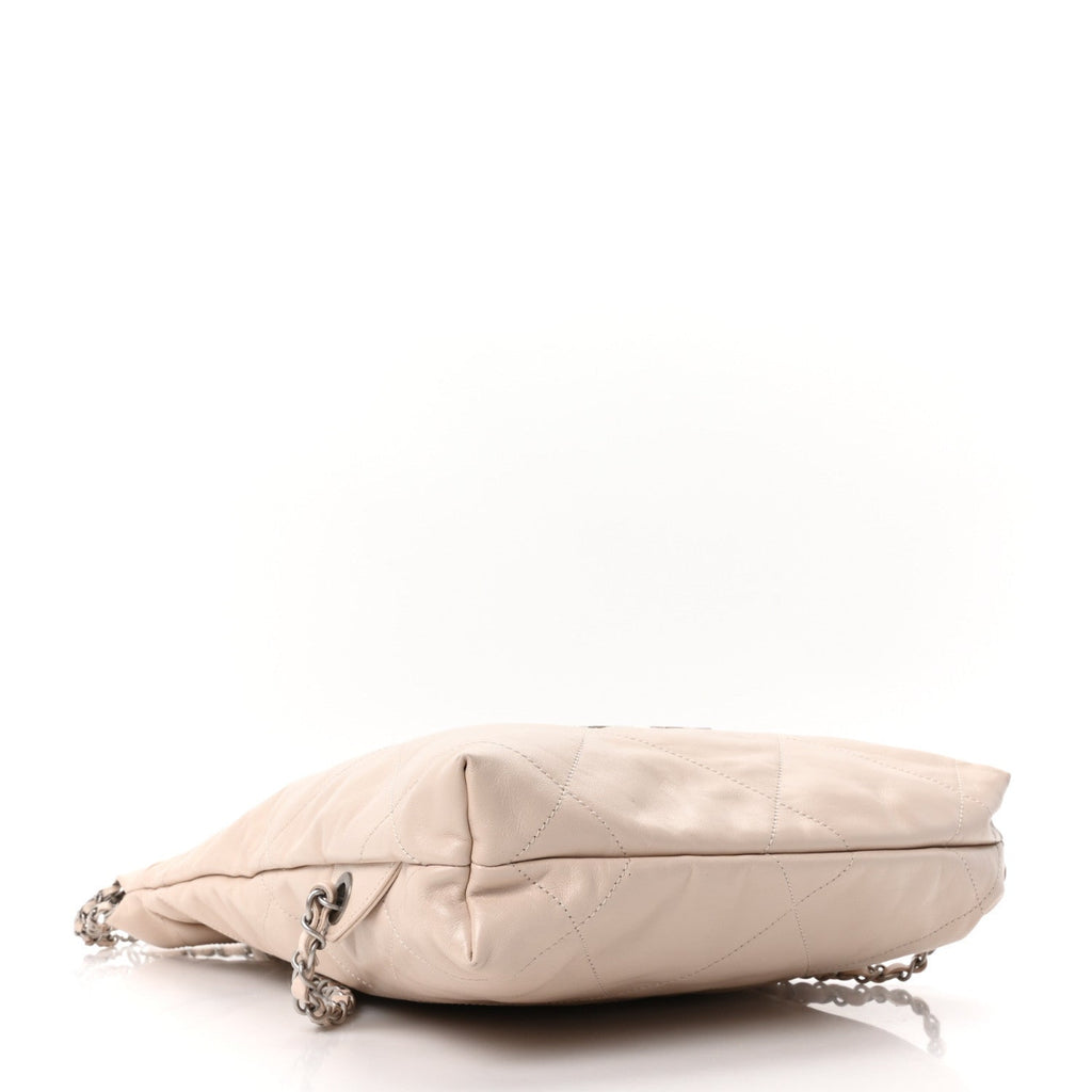 Shiny Calfskin Quilted Chanel 22 Backpack Beige