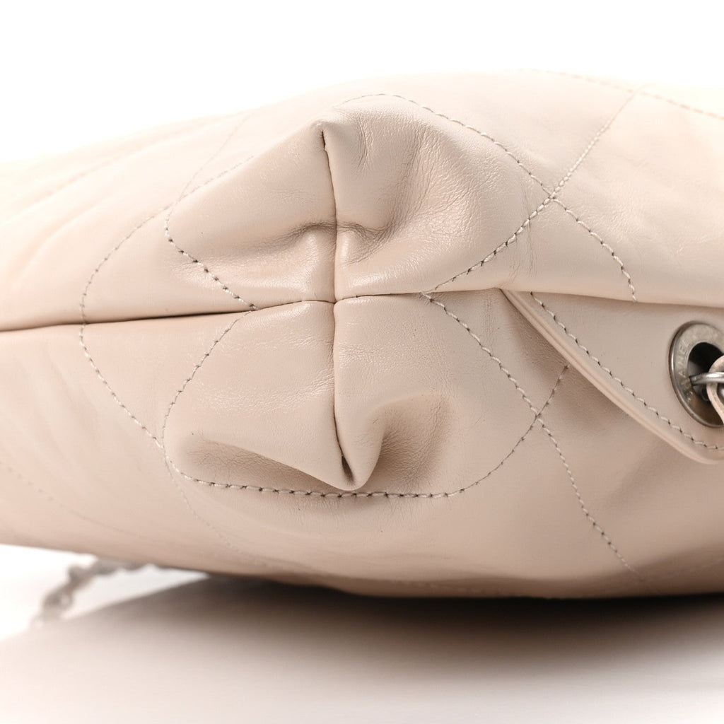 Shiny Calfskin Quilted Chanel 22 Backpack Beige